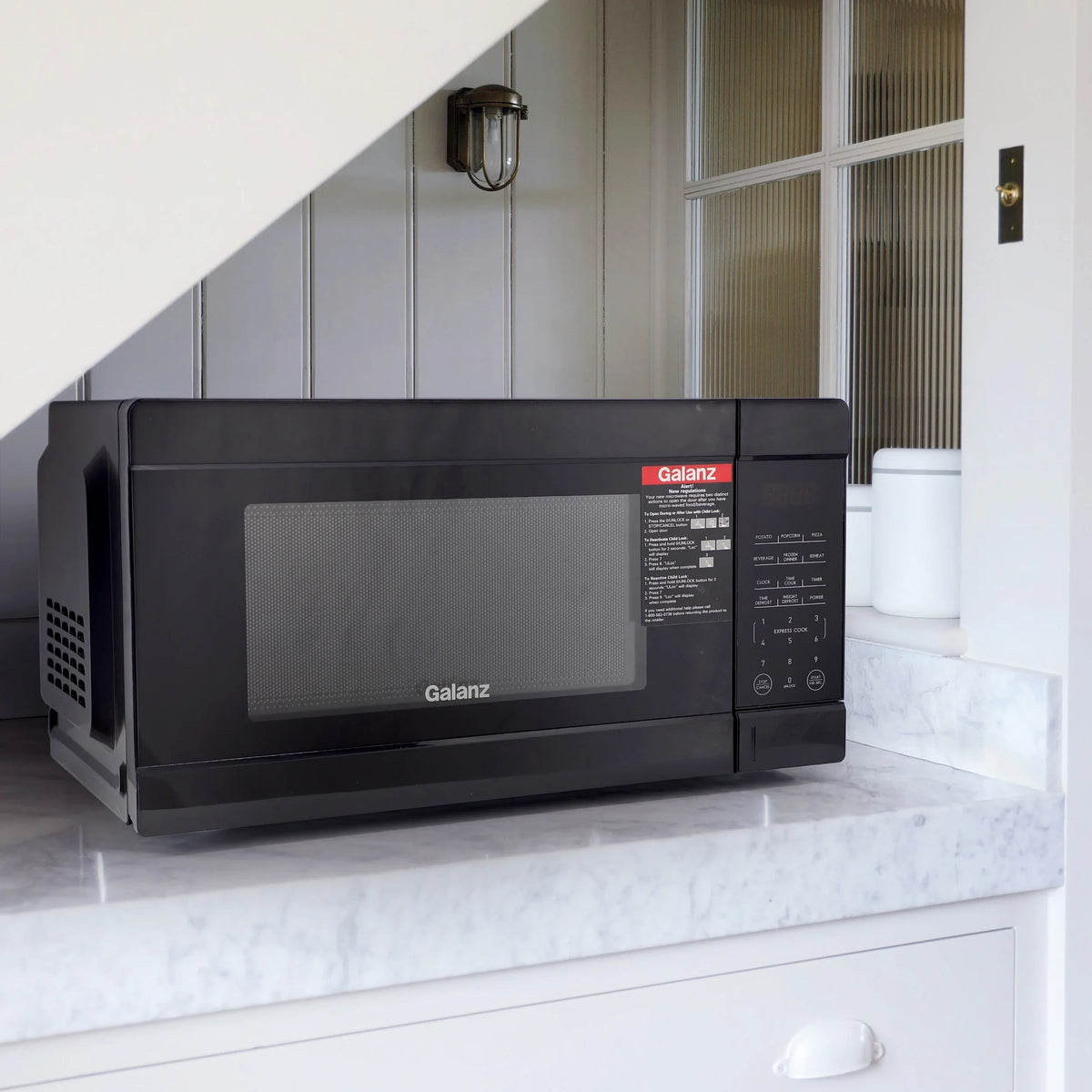 Galanz 1.1 Cu Ft. 1000 Watt Counter Top Microwave Oven in Black - image 6